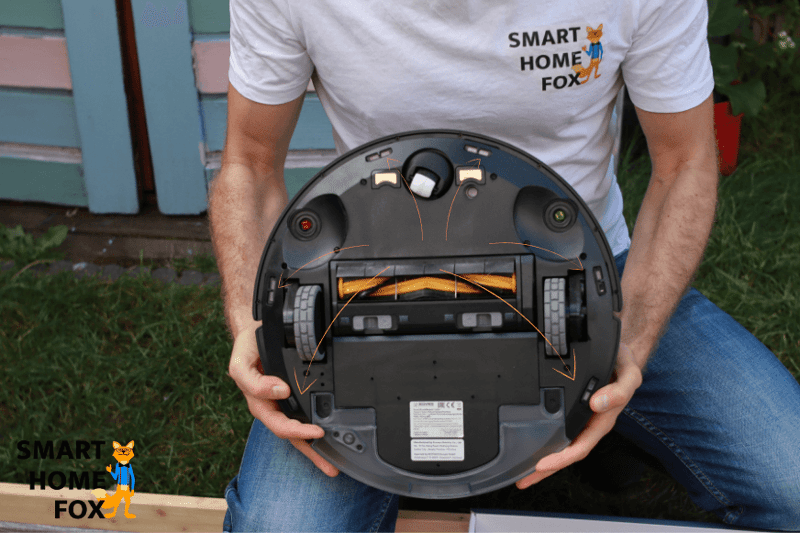 Crash sensors on the bottom side of a robot vacuum